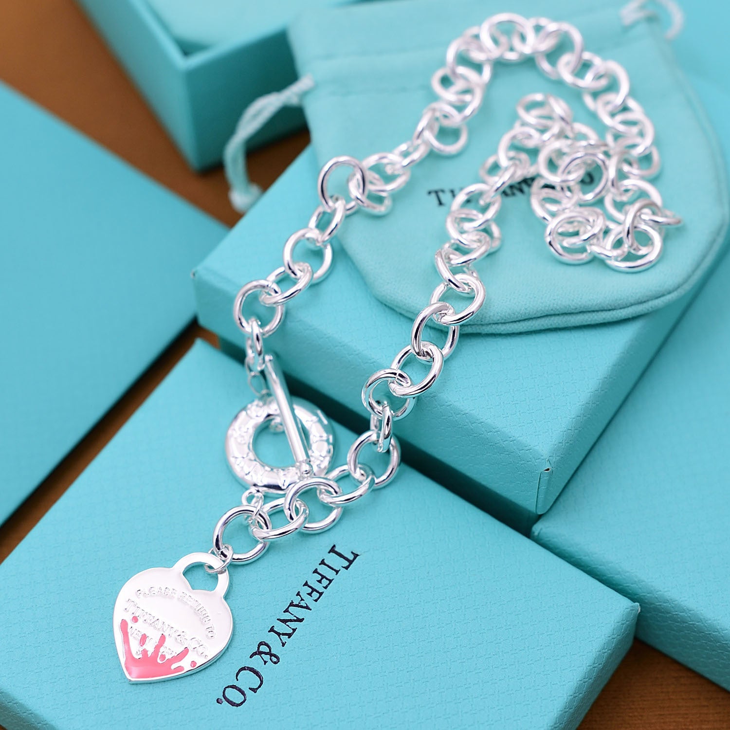 Return to Tiffany Heart pink Tag Charm Bracelet in Sterling Silver