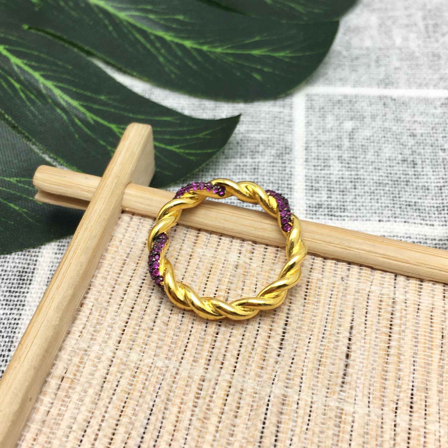 Twisted Ring with pink sapphire