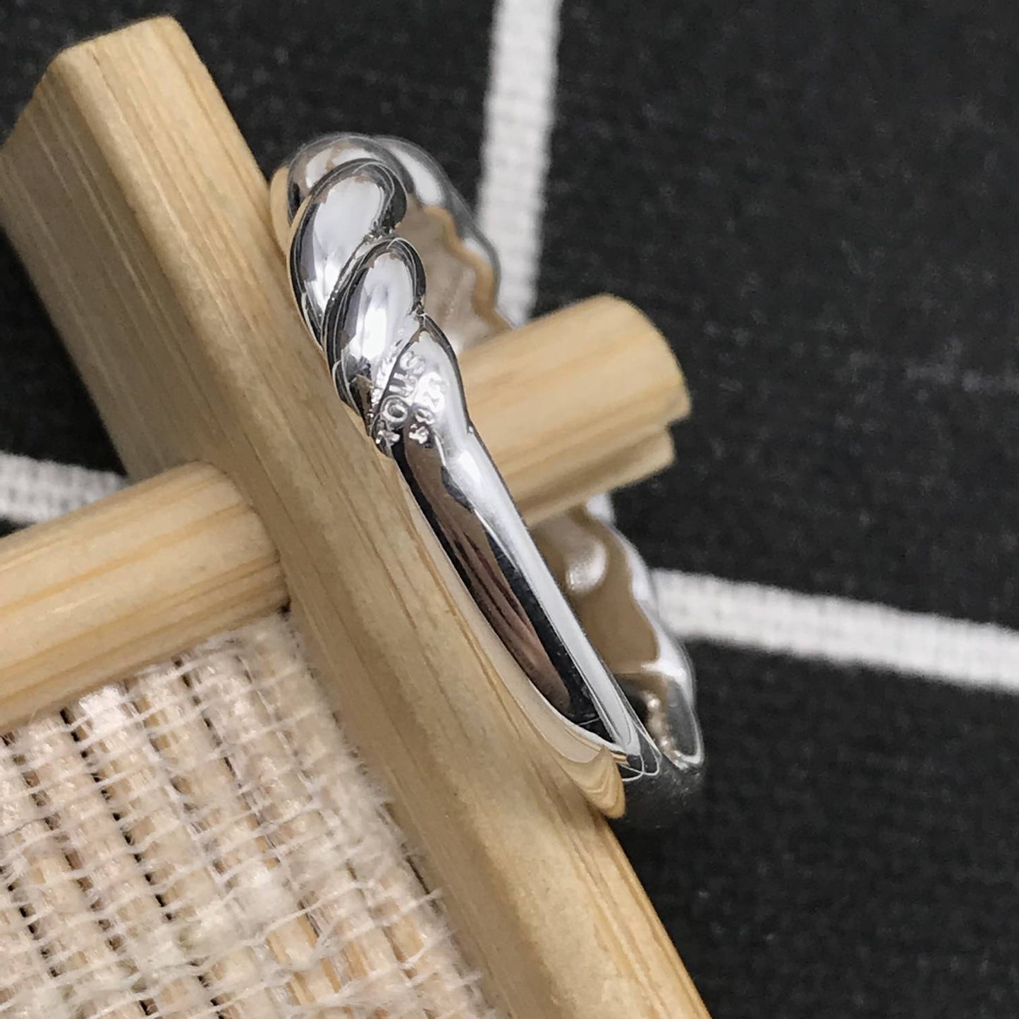 Twisted braided silver ring bear motif