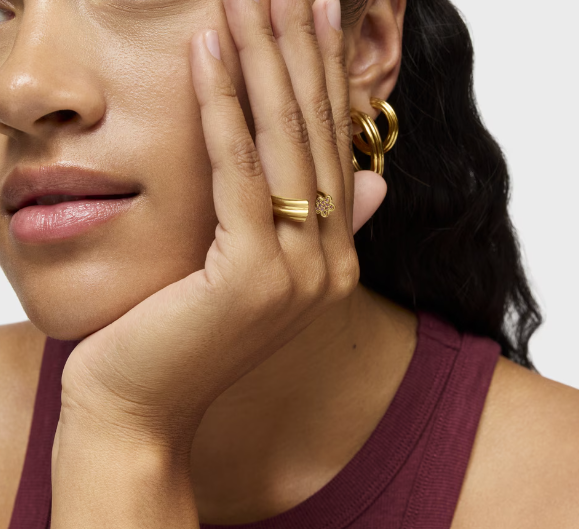 Plating over silver open Ring with flower motif with rhodolites 1950