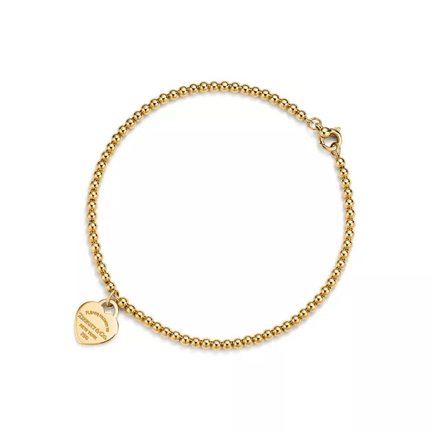 Return to Tiffany® Mini Heart Tag Bead Bracelet in Yellow Gold