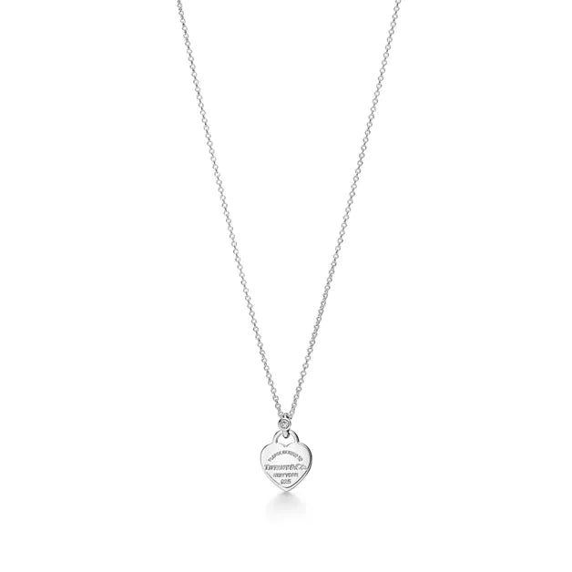 Return to Tiffany® Mini Heart Tag Pendant in Sterling Silver with a Diamond