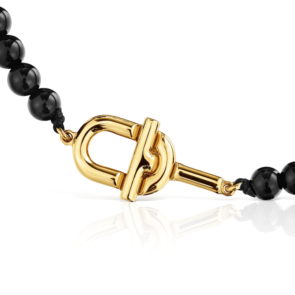 Bracelet with 18kt gold plating over silver and onyx MANIFESTO