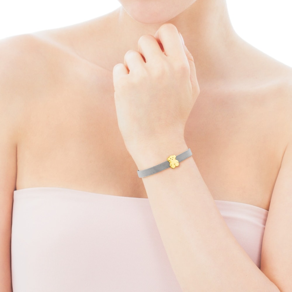 Mesh bracelet in 18kt yellow gold and steel. Size of bear 0.7 cm. Length 16cm