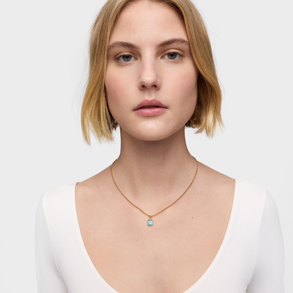 Small plating over silver Pendant with topaz Medallions |