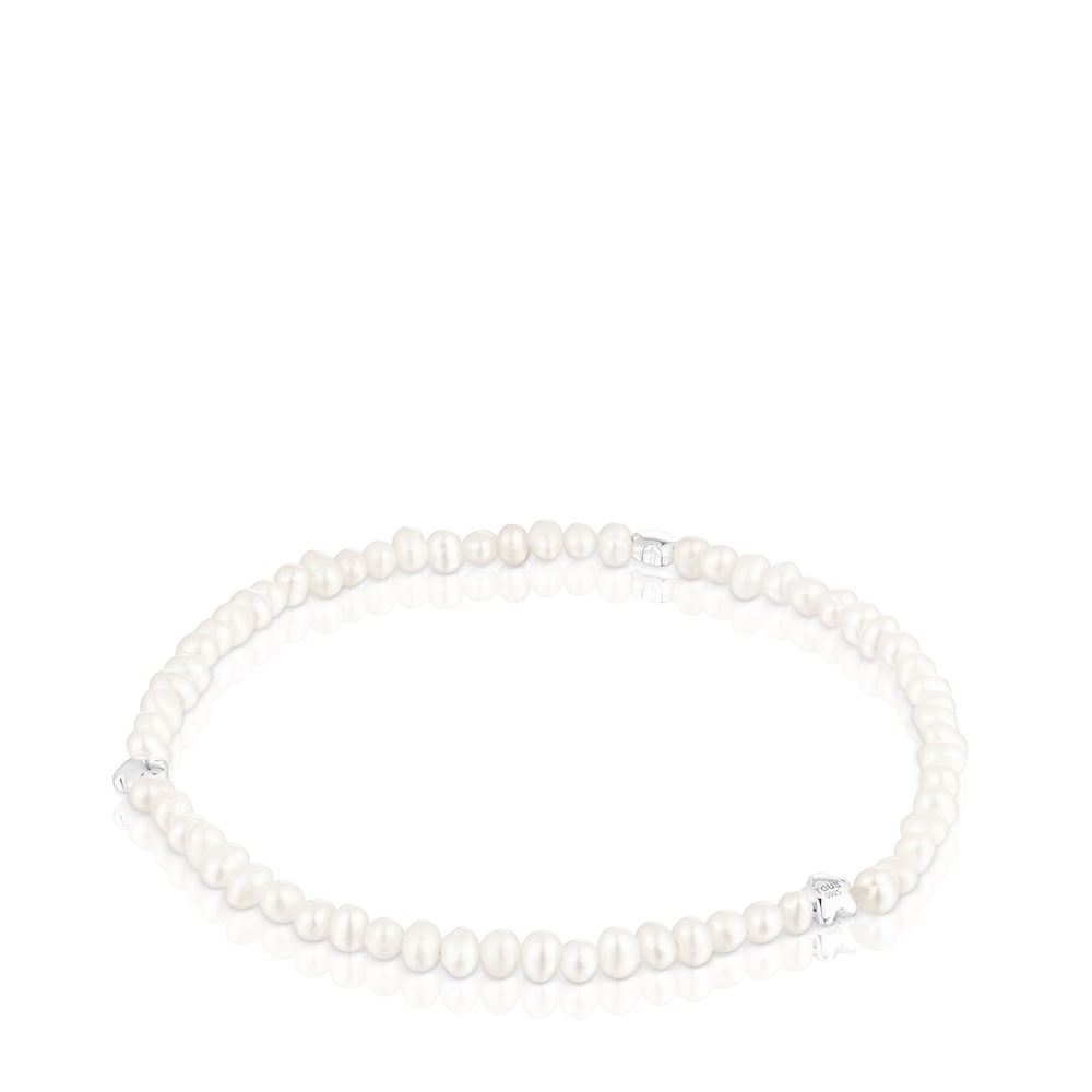 Elastic Bold Motif Bracelet with cultured pearls and flower motifs in silver |