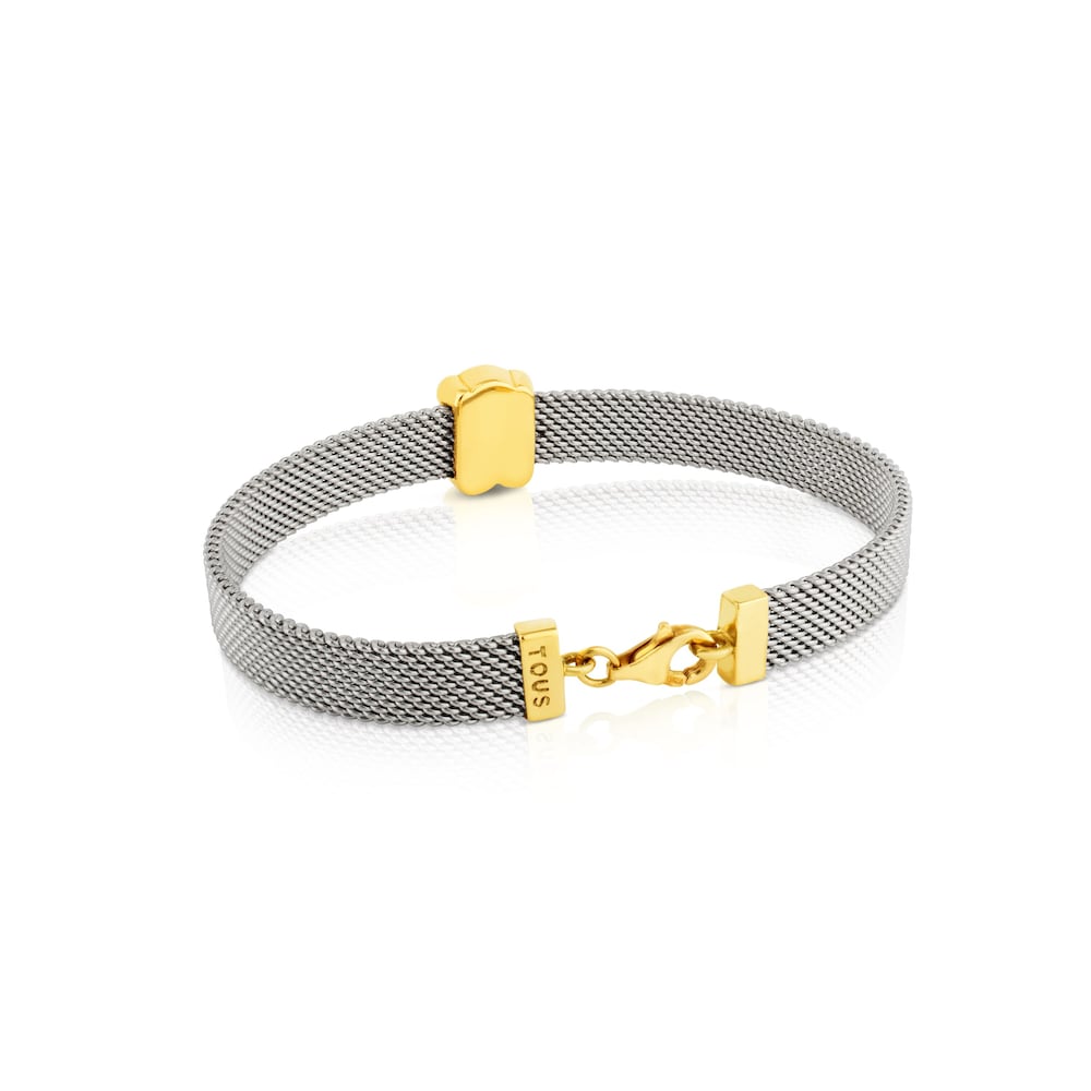 Mesh bracelet in 18kt yellow gold and steel. Size of bear 0.7 cm. Length 16cm