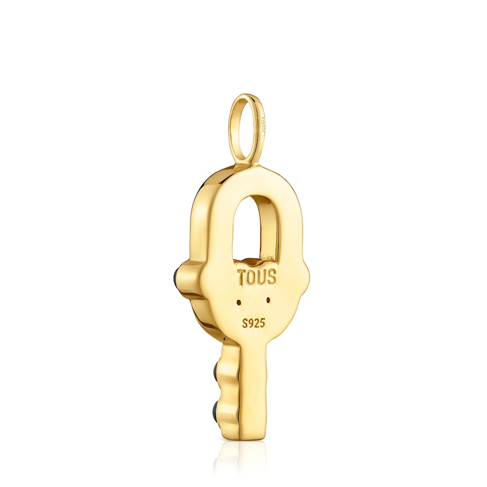 Pendant with 18kt gold plating over silver and onyx MANIFESTO