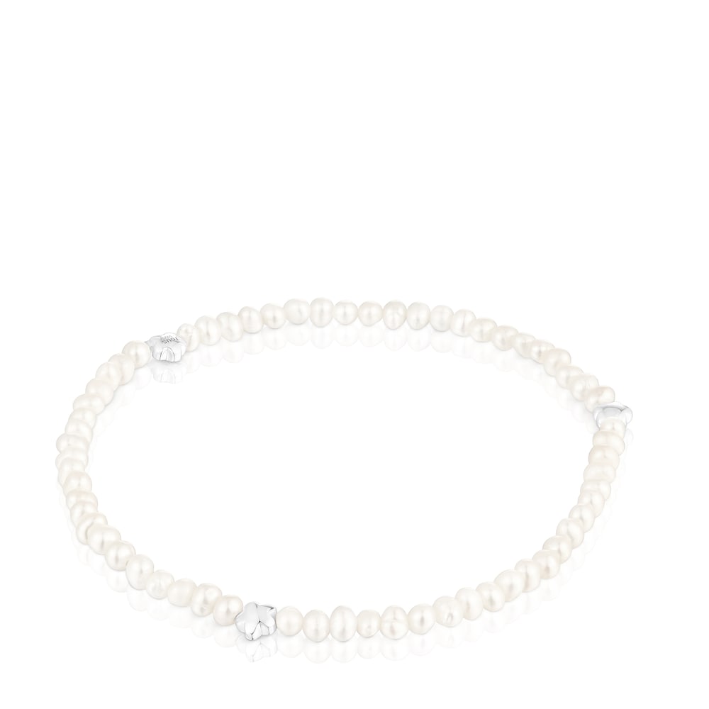 Elastic Bold Motif Bracelet with cultured pearls and flower motifs in silver |