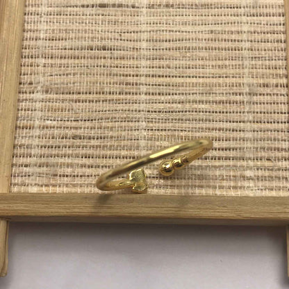 Small open Ring with  plating over silver and motifs Grain