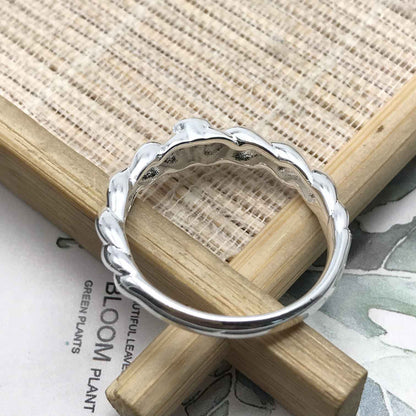 Twisted braided silver ring bear motif