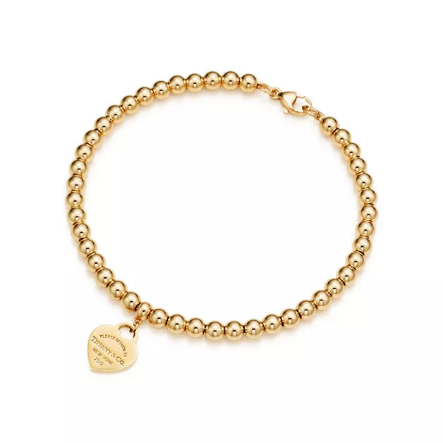 Return to Tiffany® Heart Tag Bead Bracelet in Yellow Gold