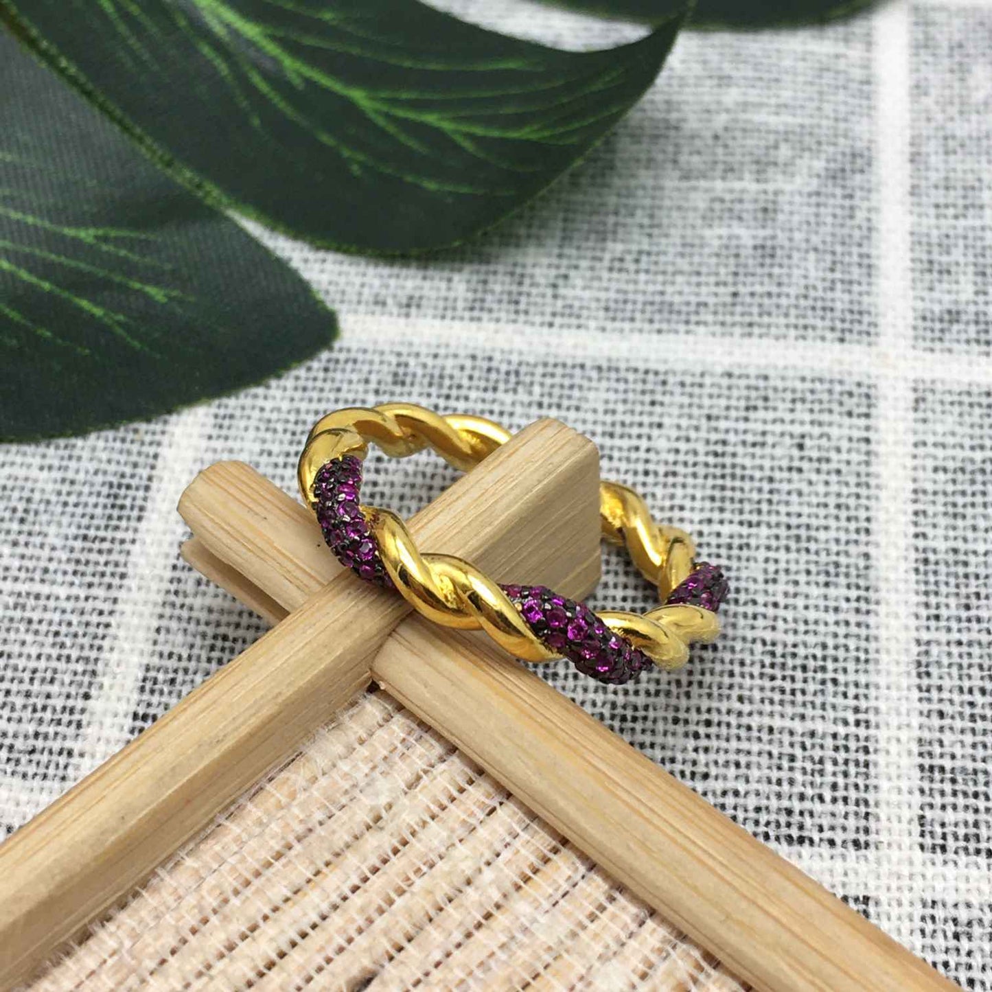 Twisted Ring with pink sapphire