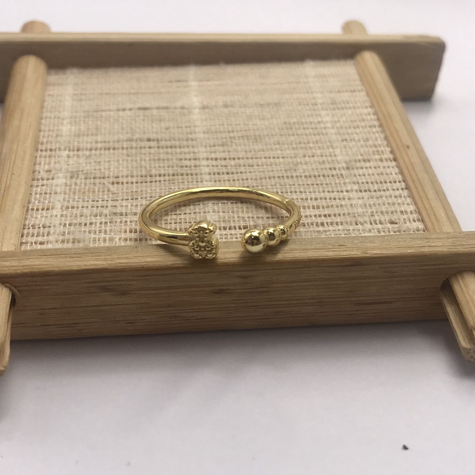 Small open Ring with  plating over silver and motifs Grain