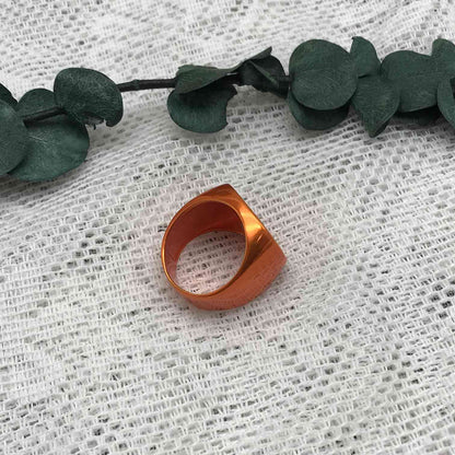 Oursin seal in orange sterling silver with a central bear with  plating over silver
