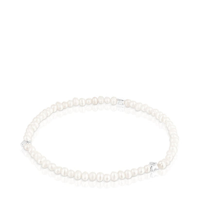 Elastic Bold Motif Bracelet with cultured pearls and flower motifs in silver |