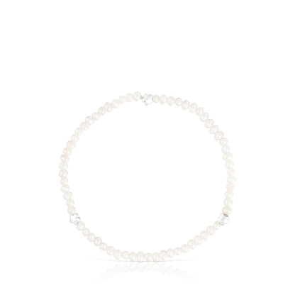 Elastic Bold Motif Bracelet with cultured pearls and flower motifs in silver |