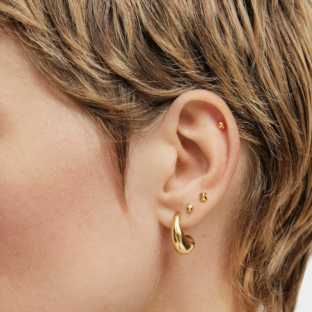 Pack of Balloon Ear piercings in gold-colored IP steel |