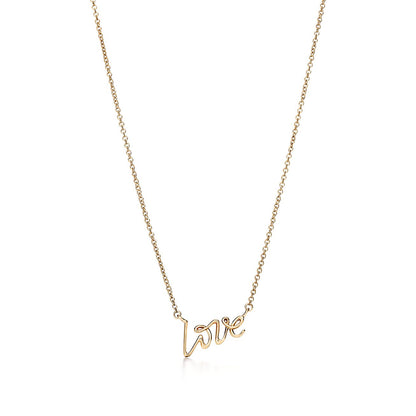 Paloma's Graffiti love pendant in gold, mini. |